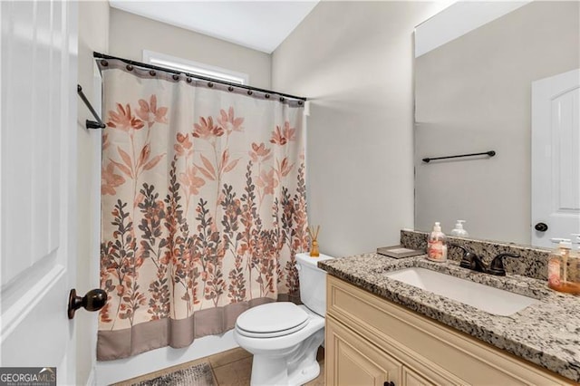 95 Summerlyn Dr, Hiram, GA 30141 - full bathroom featuring vanity, toilet, and tile patterned floors