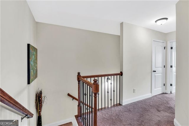 95 Summerlyn Dr, Hiram, GA 30141 - hallway with an upstairs landing, carpet flooring, and baseboards