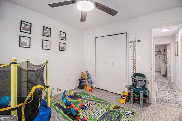 90 Chimney Rise Ct, Stockbridge, GA 30281 - playroom with ceiling fan, carpet flooring, and baseboards