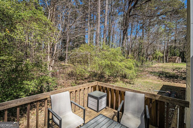 90 Chimney Rise Ct, Stockbridge, GA 30281 - deck with view of scattered trees