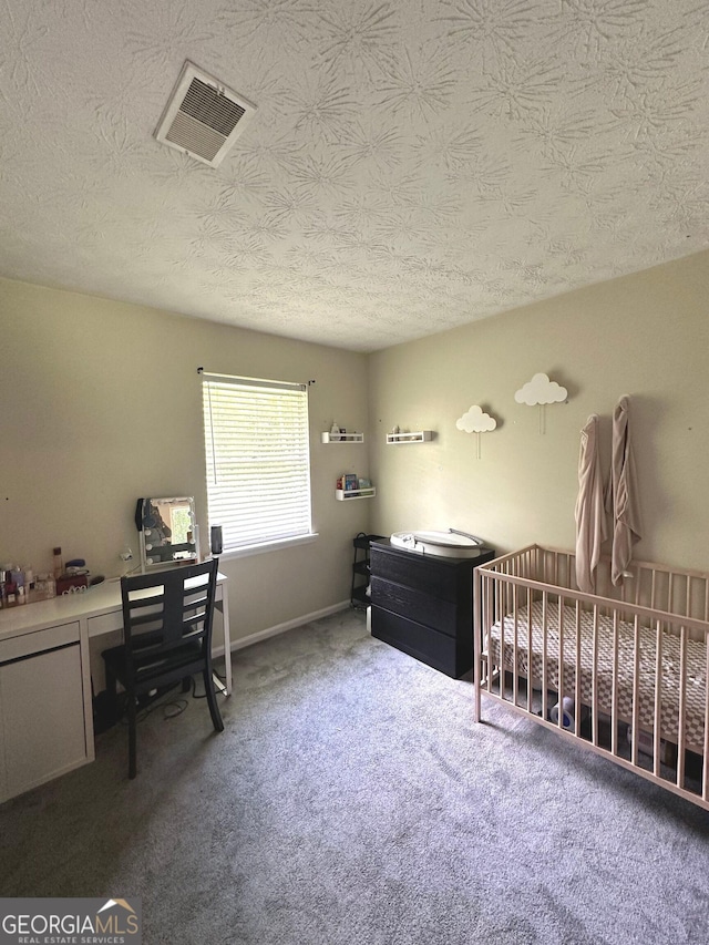 2900 Haddon Dr, Rex, GA 30273 - bedroom featuring a desk, carpet floors, and a textured ceiling