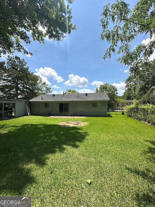 2900 Haddon Dr, Rex, GA 30273 - rear view of house featuring a lawn