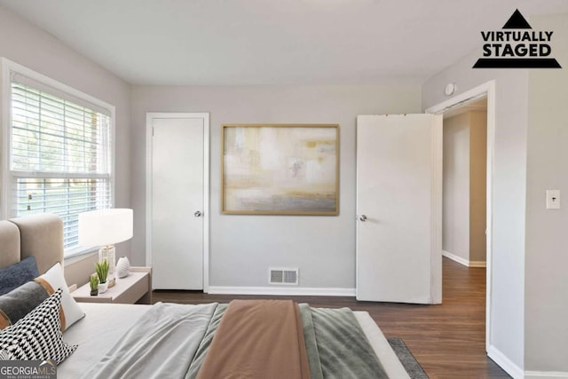 121 Hillsdale Dr SE, Atlanta, GA 30315 - bedroom featuring multiple windows and wood finished floors