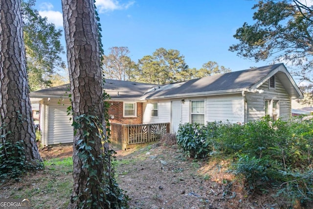 121 Hillsdale Dr SE, Atlanta, GA 30315 - rear view of house with a wooden deck