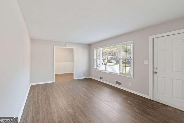 121 Hillsdale Dr SE, Atlanta, GA 30315 - unfurnished living room featuring dark wood finished floors