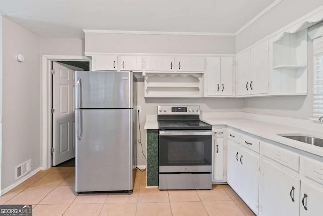 121 Hillsdale Dr SE, Atlanta, GA 30315 - kitchen with appliances with stainless steel finishes, open shelves, white cabinets, light countertops, and light tile patterned floors