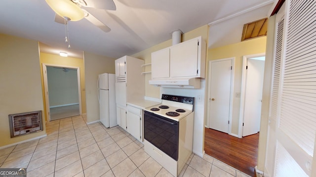 kitchen featuring open shelves, white appliances, light countertops, under cabinet range hood, and white cabinets