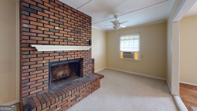 unfurnished living room with a ceiling fan, crown molding, a brick fireplace, cooling unit, and carpet
