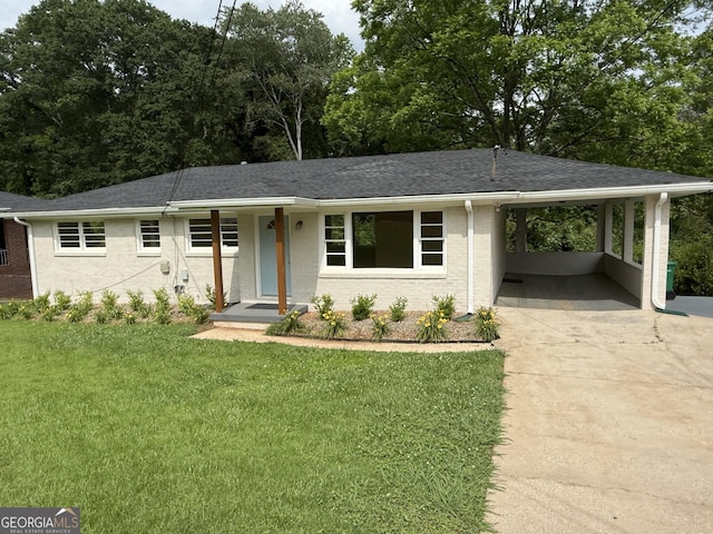2502 Miriam Ln, Decatur, GA 30032 - single story home with driveway, a front yard, an attached carport, and a shingled roof