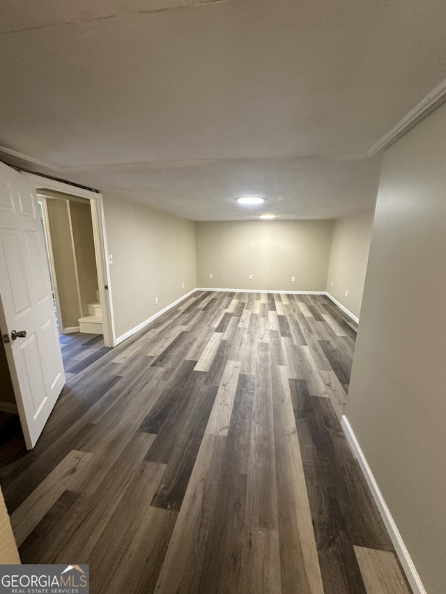 2502 Miriam Ln, Decatur, GA 30032 - spare room with dark wood finished floors, baseboards, and stairway
