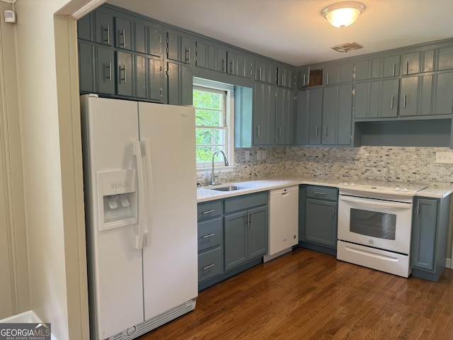 2502 Miriam Ln, Decatur, GA 30032 - kitchen with white appliances, a sink, tasteful backsplash, and light countertops
