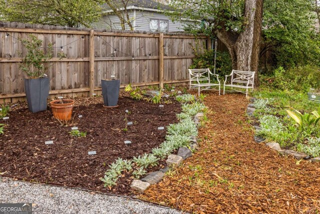 view of yard with fence