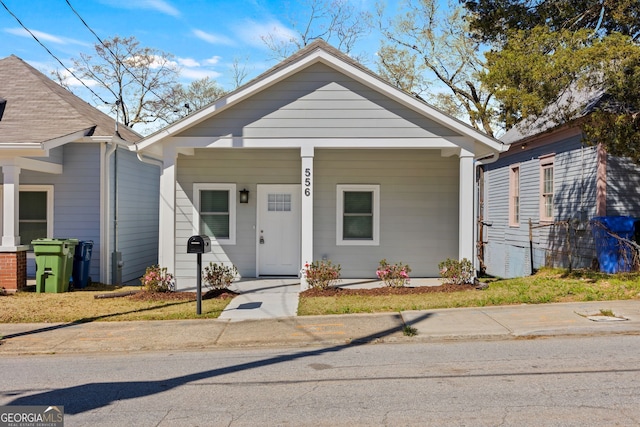 556 James P Brawley Dr NW, Atlanta, GA 30318 - view of front of property featuring covered porch