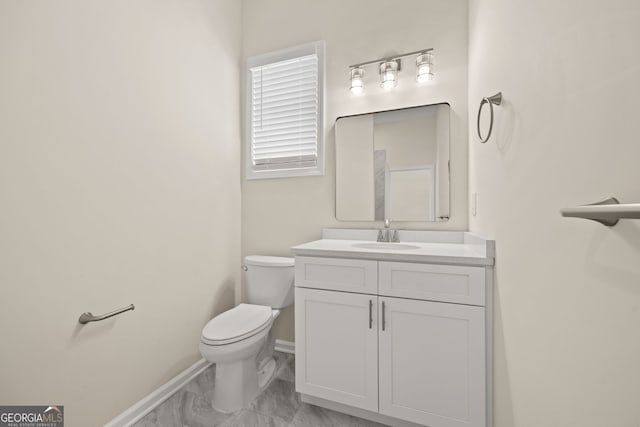 556 James P Brawley Dr NW, Atlanta, GA 30318 - bathroom featuring marble look tiles and vanity