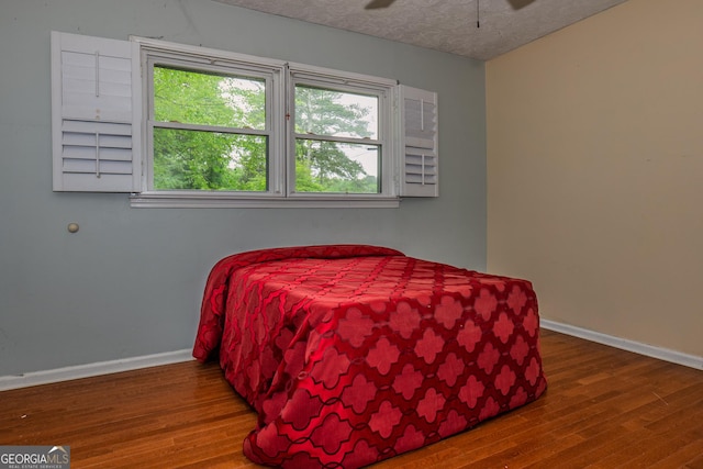 210 Briarwood Dr, Dallas, GA 30132 - bedroom featuring wood finished floors, baseboards, and ceiling fan