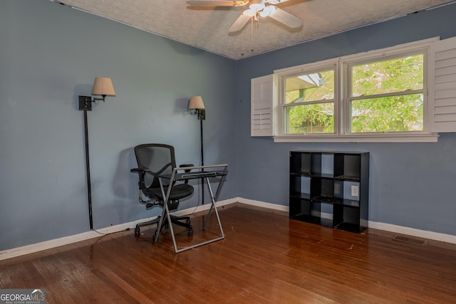 210 Briarwood Dr, Dallas, GA 30132 - living area with wood finished floors, baseboards, a ceiling fan, and an office area
