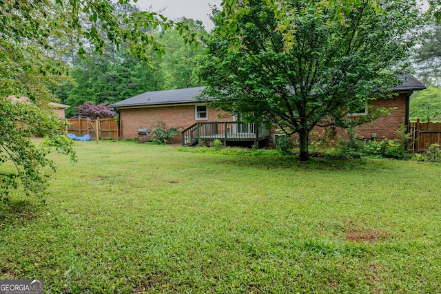 210 Briarwood Dr, Dallas, GA 30132 - view of yard with a wooden deck