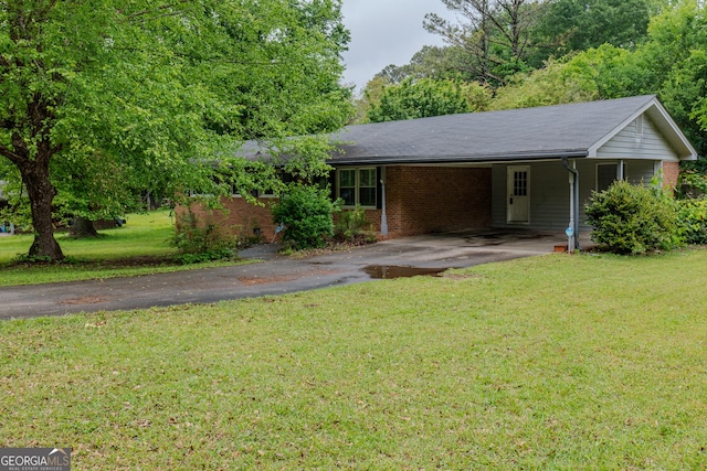 210 Briarwood Dr, Dallas, GA 30132 - single story home with brick siding, driveway, a front yard, and a carport
