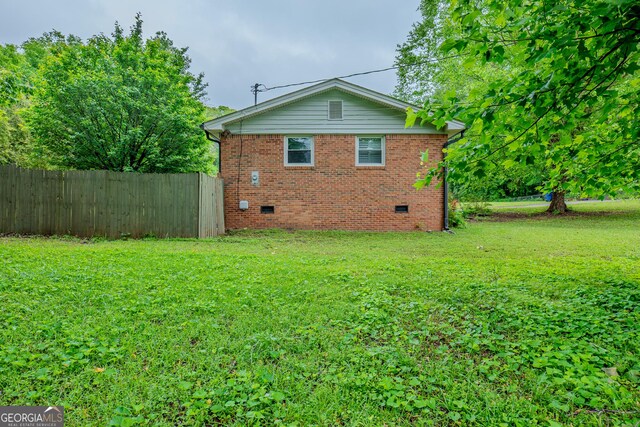 210 Briarwood Dr, Dallas, GA 30132 - back of house with crawl space and brick siding