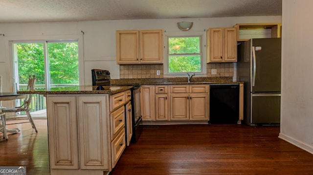 210 Briarwood Dr, Dallas, GA 30132 - kitchen with black appliances, dark wood-style floors, tasteful backsplash, and a textured ceiling
