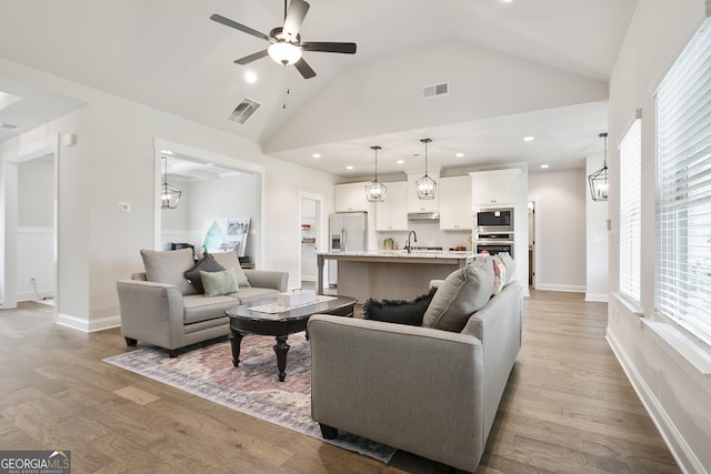 8 Hardin Ct Lot 16, Newnan, GA 30263 - living area featuring a ceiling fan, lofted ceiling, wood finished floors, recessed lighting, and baseboards