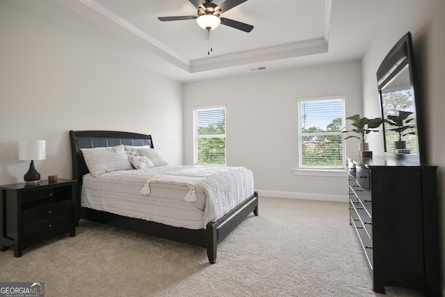 8 Hardin Ct Lot 16, Newnan, GA 30263 - bedroom with light carpet, ornamental molding, baseboards, a tray ceiling, and a ceiling fan
