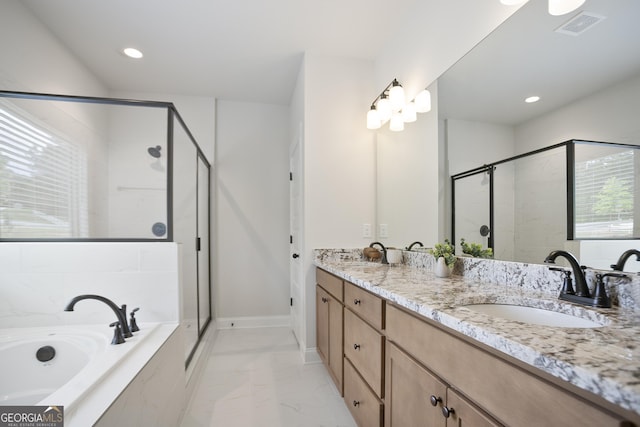 8 Hardin Ct Lot 16, Newnan, GA 30263 - full bathroom featuring a shower stall, a garden tub, marble look tile flooring, double vanity, and recessed lighting