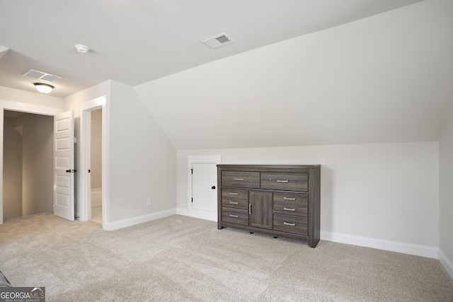 8 Hardin Ct Lot 16, Newnan, GA 30263 - bonus room with light colored carpet, vaulted ceiling, and baseboards