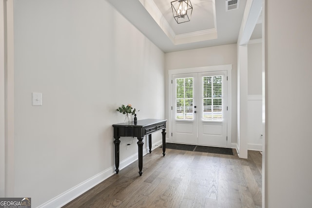 8 Hardin Ct Lot 16, Newnan, GA 30263 - foyer featuring dark wood finished floors, crown molding, a chandelier, french doors, and baseboards