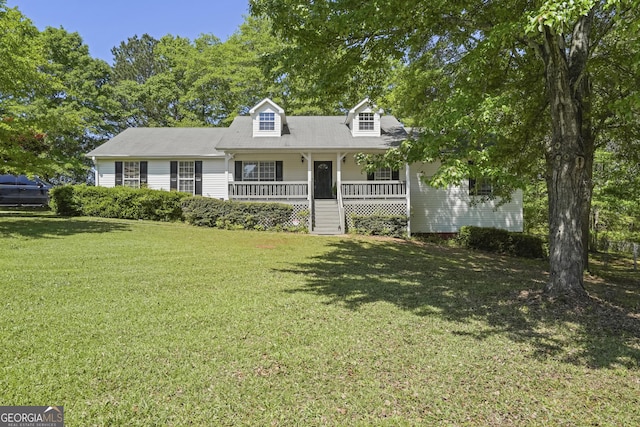 view of front facade with covered porch and fence