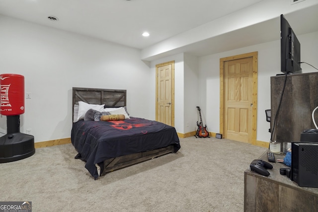 bedroom featuring carpet, a textured ceiling, and recessed lighting