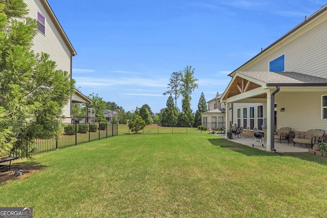 view of yard featuring a patio and a fenced backyard