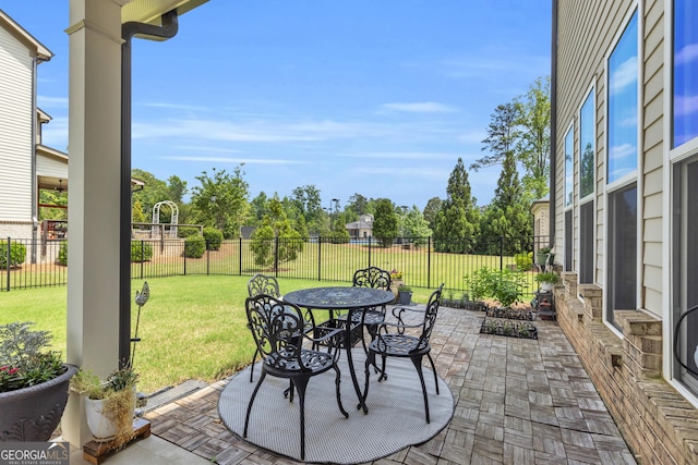 view of patio / terrace with outdoor dining area and a fenced backyard