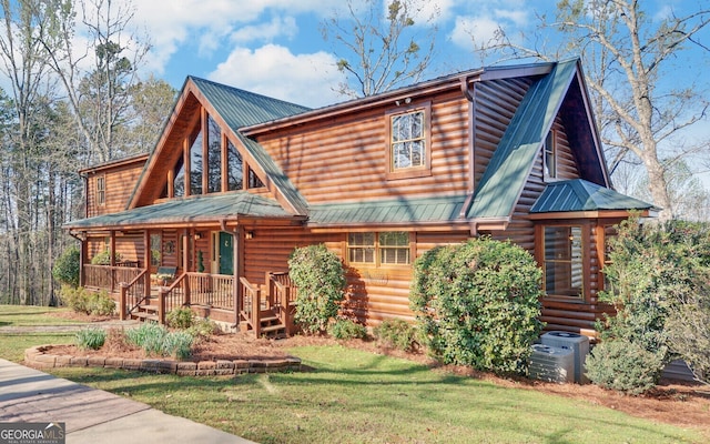 221 Laurel Cir, Dahlonega, GA 30533 - log cabin with central AC, covered porch, and a front lawn