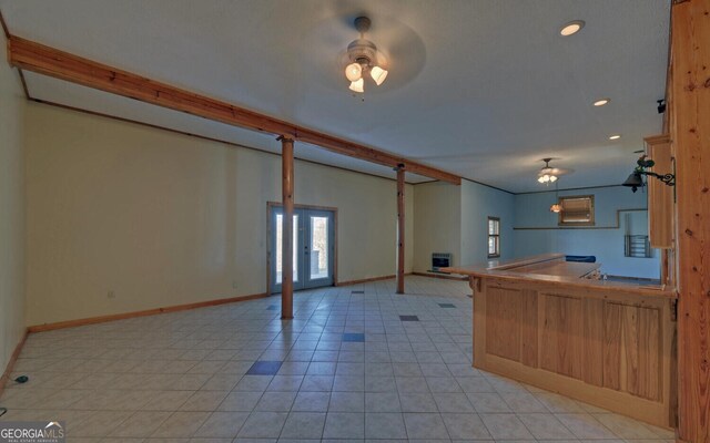 221 Laurel Cir, Dahlonega, GA 30533 - kitchen with baseboards, a peninsula, recessed lighting, and light tile patterned floors