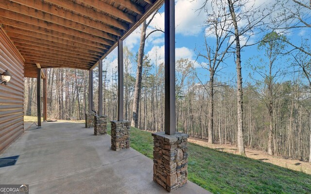 221 Laurel Cir, Dahlonega, GA 30533 - view of patio featuring a forest view