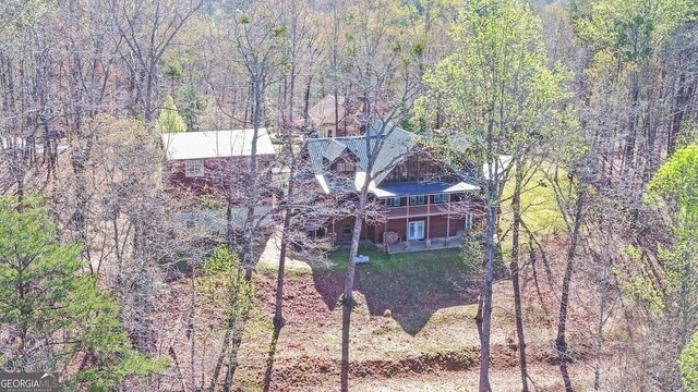 221 Laurel Cir, Dahlonega, GA 30533 - drone / aerial view featuring a wooded view