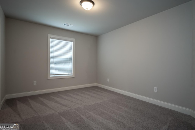 244 Meeler Cir, Bogart, GA 30622 - spare room with dark colored carpet