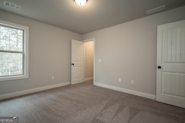 244 Meeler Cir, Bogart, GA 30622 - unfurnished bedroom featuring carpet floors and baseboards