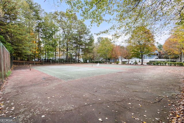 view of sport court with fence