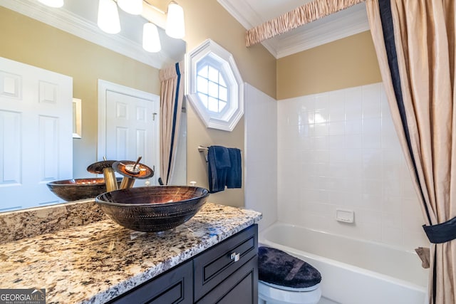 full bathroom with shower / tub combo, crown molding, toilet, and vanity