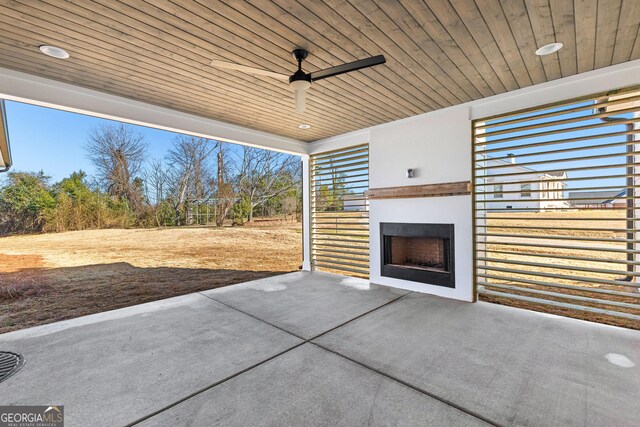 view of patio featuring ceiling fan