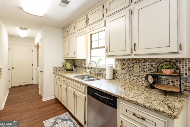 260 Peachtree Ln, Newnan, GA 30265 - kitchen with dishwasher, a sink, dark wood-style flooring, tasteful backsplash, and light stone countertops