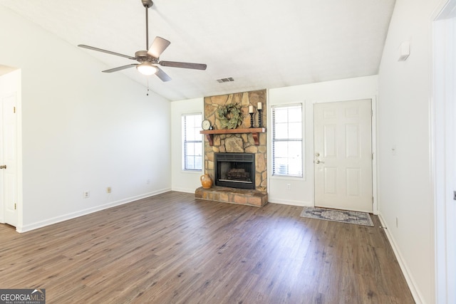 260 Peachtree Ln, Newnan, GA 30265 - unfurnished living room featuring vaulted ceiling, ceiling fan, wood finished floors, a fireplace, and baseboards
