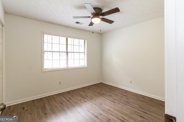 260 Peachtree Ln, Newnan, GA 30265 - spare room with wood finished floors, baseboards, and ceiling fan