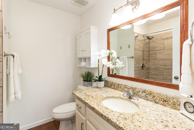 260 Peachtree Ln, Newnan, GA 30265 - full bath featuring vanity, toilet, a tile shower, and baseboards
