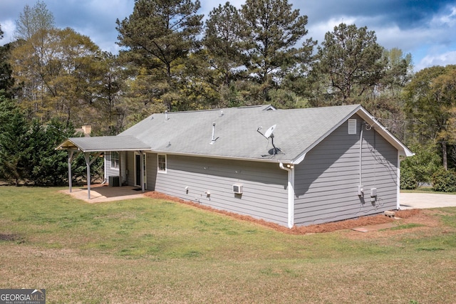 260 Peachtree Ln, Newnan, GA 30265 - rear view of house featuring a patio area, a lawn, central AC, a chimney, and view of scattered trees
