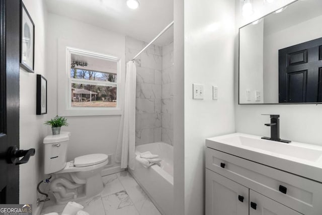 bathroom featuring marble finish floor, toilet, shower / bath combination with curtain, and vanity