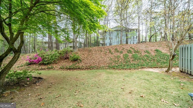 view of yard featuring fence