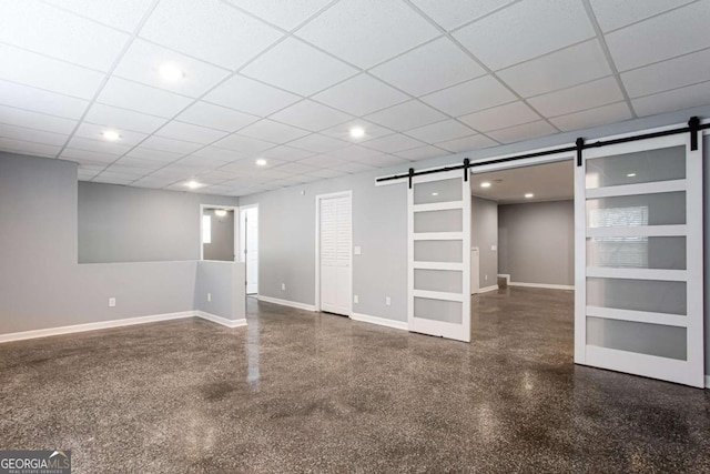 1924 Sweet Flag Rd, Lawrenceville, GA 30045 - below grade area with a barn door and baseboards